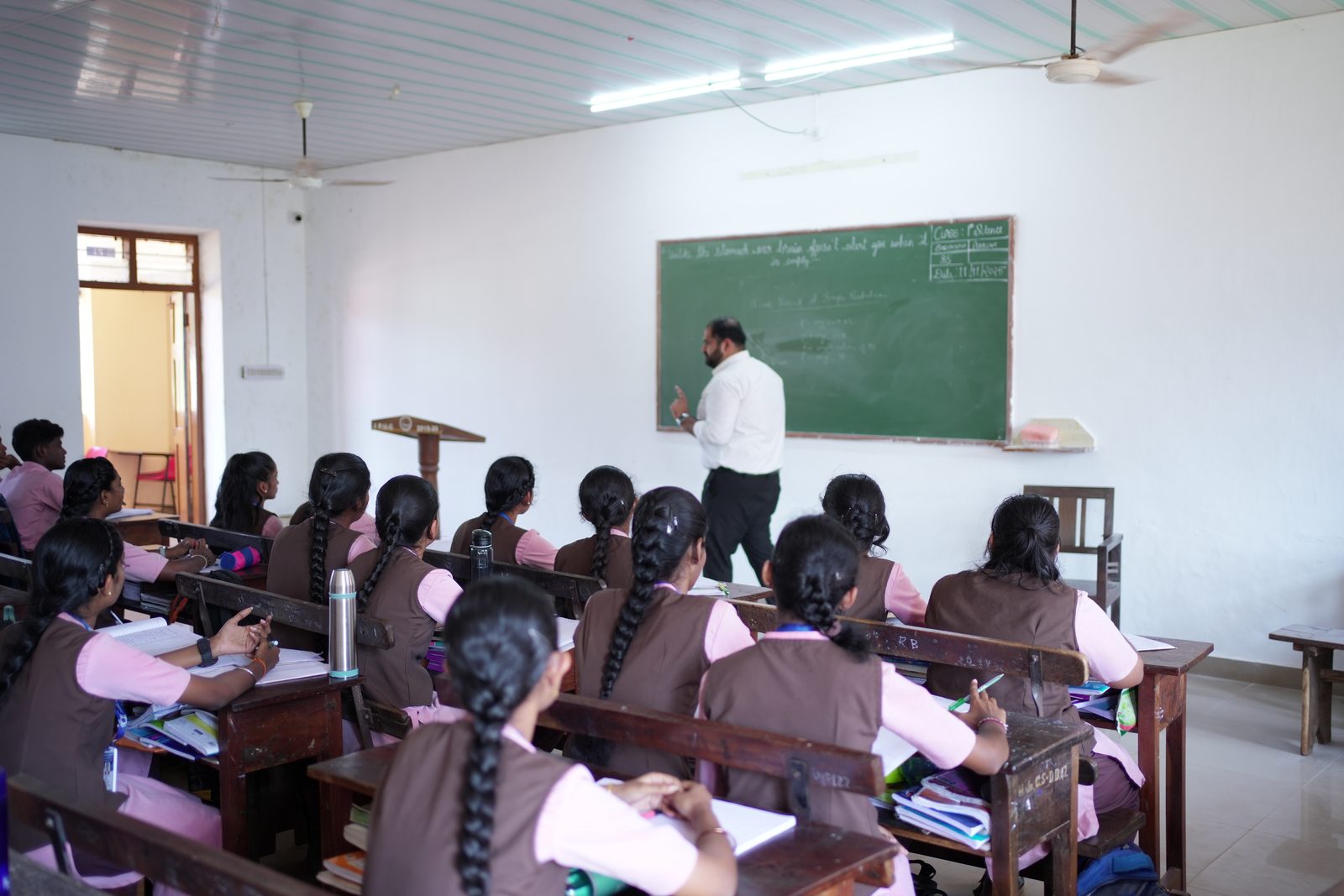 Lecturer teaching at the blackboard