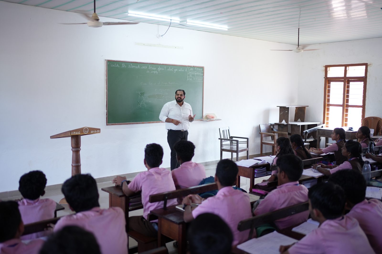 Lecturer addressing a Pre-University class